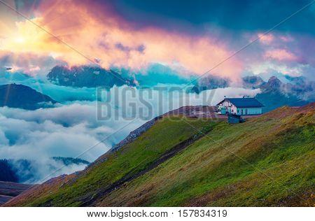 Mountain Refuge In The Foggy Val Di Fassa Valley