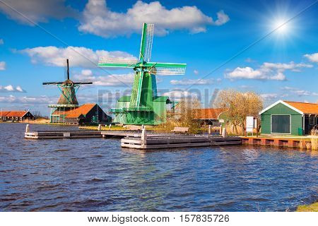 Authentic Zaandam Mills On The Water Channel In Zaanstad Willage.