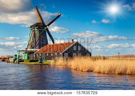 Authentic Zaandam Mills On The Water Channel In Zaanstad Willage