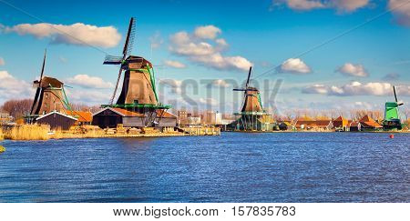 Authentic Zaandam Mills On The Water Channel In Zaanstad Willage