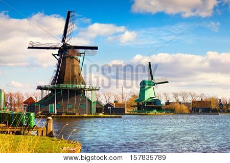 Authentic Zaandam Mills On The Water Channel In Zaanstad Willage