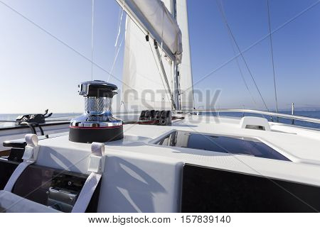 sail vessel surfing through the aegean sea