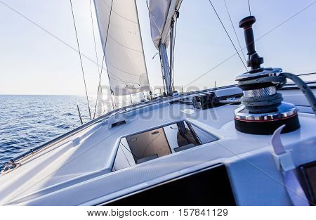 sail vessel surfing through the aegean sea