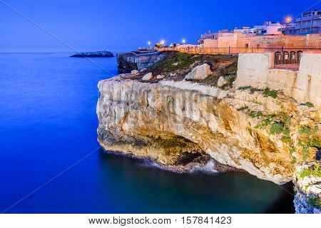 Puglia Italy. Sunset scenery of Polignano a Mare town in the province of Bari Apulia southern Italia on the Adriatic Sea
