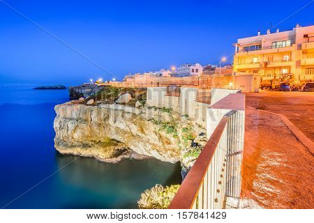 Puglia Italy. Sunset scenery of Polignano a Mare town in the province of Bari Apulia southern Italia on the Adriatic Sea
