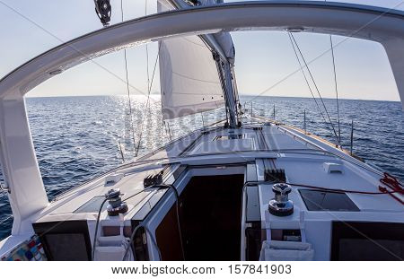 sail vessel surfing through the aegean sea
