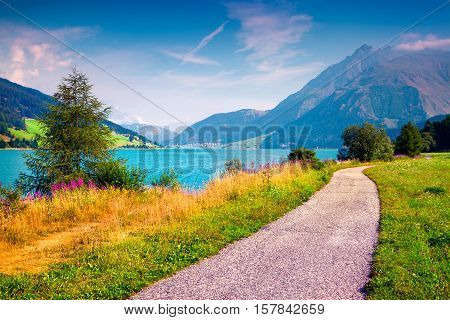 Bicycle Path Around Resia Lake In The Italian Alps.
