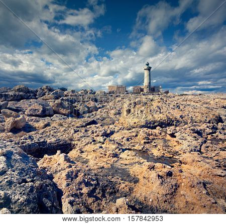 Old Lighthouse On The Murro Di Porco Cape