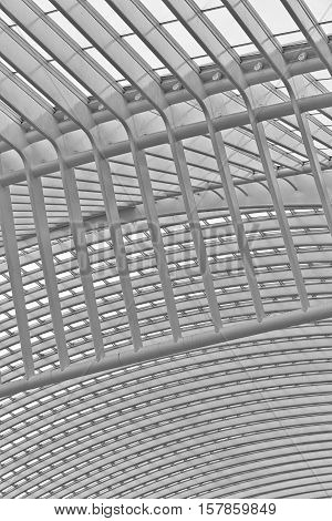 LIEGE BELGIUM - December 2014: Abstract view on the roof of the Liege-Guillemins railway station designed by Santiago Calatrava. Black and white photograph