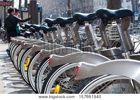 Paris, France - April 02, 2009: Two People Reserving Their Bike At Velib Station Public Bicycle Rent