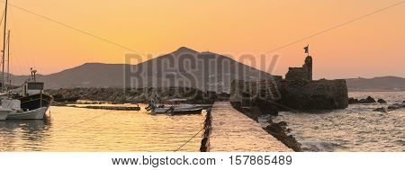 Kastelli castle at Paros island in Greece against the sunset.