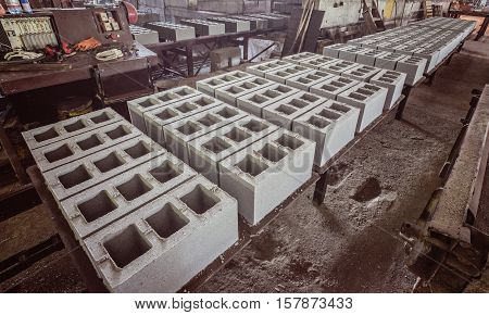Stack of precast reinforced concrete slabs in a house-building factory