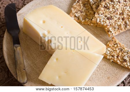 Jarlsberg a mild creamy Norwegian cheese similar to Swiss Emmental with its characteristic holes