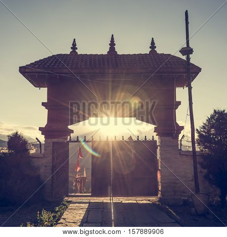 Ancient temple entrance. Buddhist sacred shrine gateway in Muktinath.