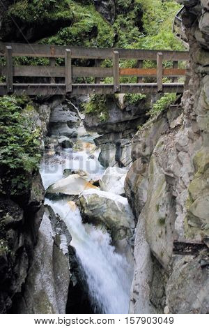 Water torrents through Stanghe, a crevice in Racines near Bolzano in northern Italy