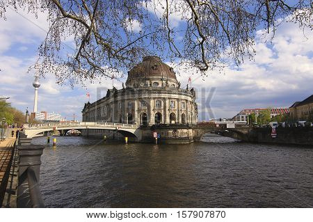 View on Bode Museum TV-Tower and the river Sprea with a touristic boat in Berlin Germany.