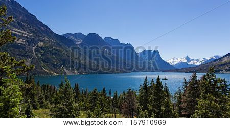 panorama view of lake and rocky mountains range in glacier national park montana usa