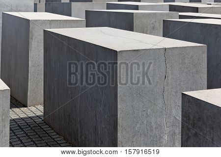 BERLIN GERMANY - JULY 2015: View of famous Jewish Holocaust Memorial near Brandenburg Gate in summer on July 27 2015 in Berlin Mitte Germany