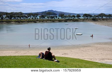 AUCKLAND - NOV 13 2016:Visitors in Dove-Myer Robinson Park and judges bay beach in Auckland New Zealand