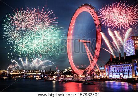 Fireworks on the riverside - celebration of the New Year in London, UK