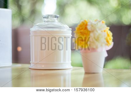 vase flower tree ribbin bokeh white plastic flower