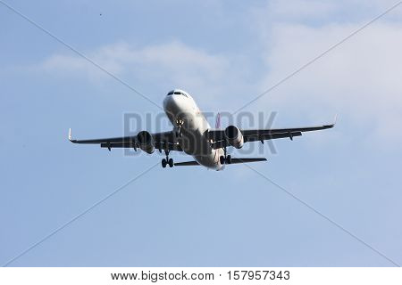 CHIANGMAI , THAILAND- FEBRUARY 19 2014 : HS-TXJ Airbus A320-200 with winglet of Thaismile airway. Landing to Chiangmai airport from Bangkok Suvarnabhumi.