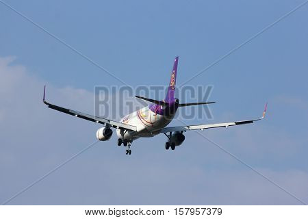CHIANGMAI , THAILAND- FEBRUARY 19 2014 : HS-TXJ Airbus A320-200 with winglet of Thaismile airway. Landing to Chiangmai airport from Bangkok Suvarnabhumi.