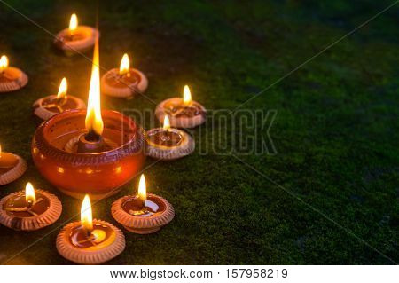 Orange Candle and beeswax  warm light in dark