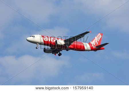 CHIANGMAI , THAILAND - FEBRUARY 19 2014: HS-BBB Airbus A320-200 of Thaiairasia. landing to Chiangmai airport from Bangkok Suvarnabhumi.