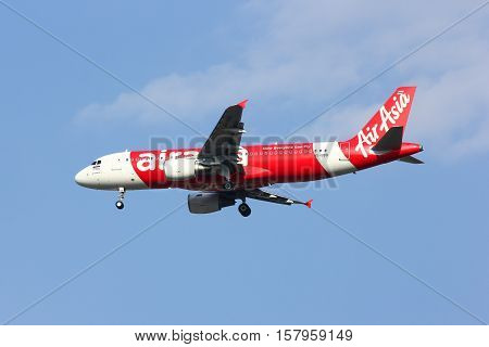 CHIANGMAI , THAILAND - FEBRUARY 19 2014: HS-BBB Airbus A320-200 of Thaiairasia. landing to Chiangmai airport from Bangkok Suvarnabhumi.