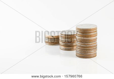 Financial saving and background concept - Close up stack of coins on white background for financial and saving artwork