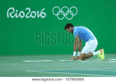 RIO DE JANEIRO, BRAZIL - AUGUST 13, 2016: Juan Martin Del Potro of Argentina celebrates victory after men's singles semifinal match of the Rio 2016 Olympic Games at Olympic Tennis Centre