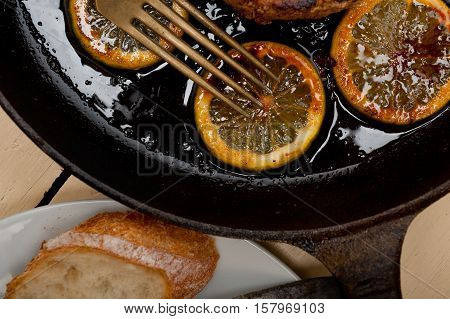 Pork Chop Seared On Iron Skillet