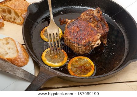 Pork Chop Seared On Iron Skillet