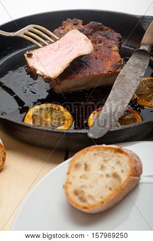Pork Chop Seared On Iron Skillet