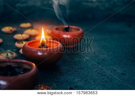Beeswax or candle light surrounding by dark nature