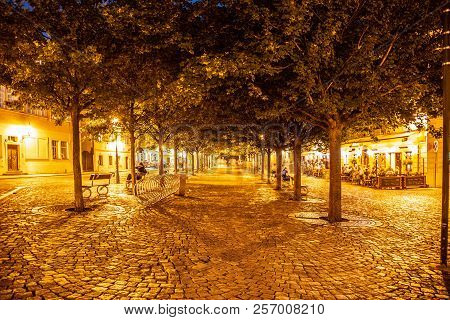 Prague, Czech Republic - August 17, 2018: Evening On Kampa Island With Cobbled Street Illuminated By