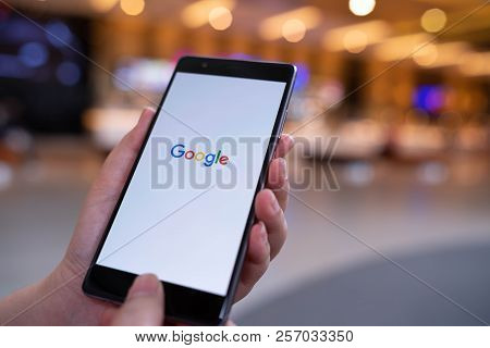 Chiang Mai, Thailand - August 03,2018: Woman Hands Holding Huawei With Google Search On Screen. Goog