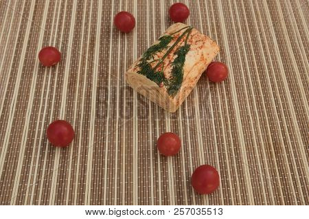 Cheese With Spices. Cheese With Paprika. Homemade Suluguni Cheese. Cheese Roll With Cherry Tomatoes.