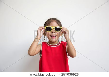 Asian Kid With Sport Shirt And Sun Glasses Fashion
