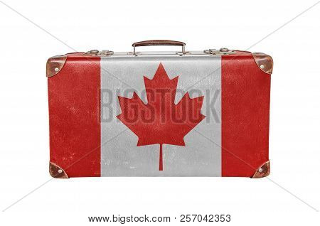 Vintage Suitcase With Canadan Flag Isolated On White Background