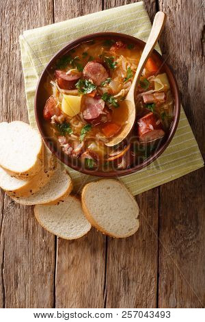 Czech Recipe: Sauerkraut Soup (zelnacka) Close-up In A Bowl. Vertical Top View