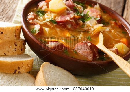 Czech Recipe: Sauerkraut Soup (zelnacka) Close-up In A Bowl. Horizontal