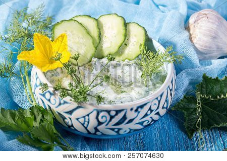 Dip Sauce Appetizer Tzatziki Of Cucumber, Yogurt, Garlic, Lemon And Dill. Creece Cuisine. Blue Woode