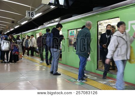 Osaka, Japan - November 23, 2016: Passengers Board A Train At Tennoji Station In Osaka, Japan. Jr We