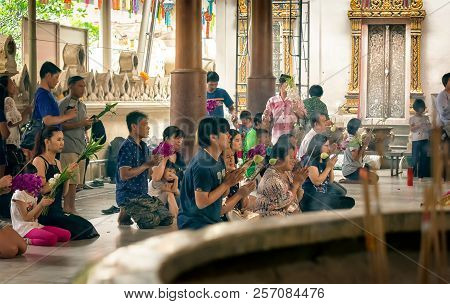 Nakhon Pathom, Thailand - August 25: Visitors Pray And Worship Buddha At Wat Rai Khing, A Popular Bu