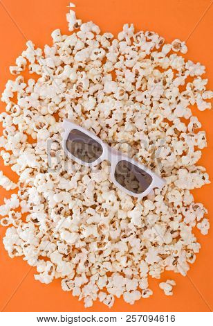 Background. Popcorn On A Bright Orange Background. 3d Glasses For Watching A Movie, Top View. Copysp