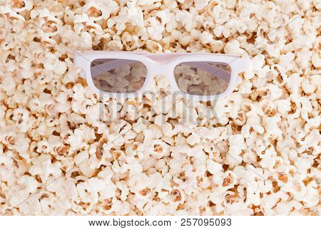 Background. Popcorn And 3d Glasses Top View, And Place For Text.flat Lay. Copyspace. Cinema Concept.