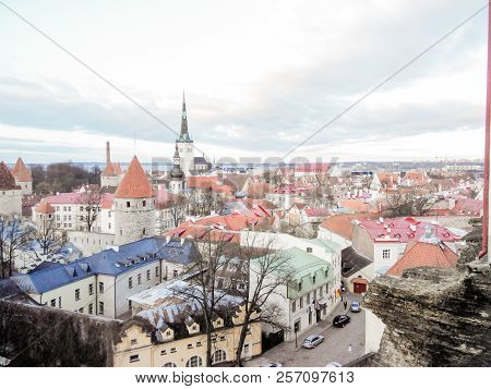 Cityscape Aerial View On The Old Town With Saint Nicholas Church Tower And Toompea Hill In Tallinn,