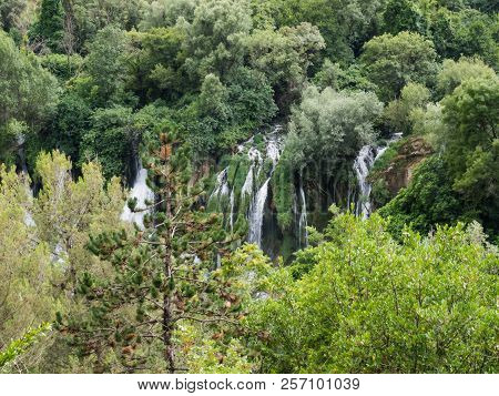 Beautiful Kravica Waterfall In Bosnia And Herzegovina - Popular Swimming And Picnic Area For Tourist